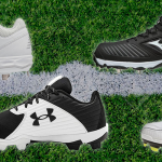 Various softball cleats for wide feet on the grass outfield